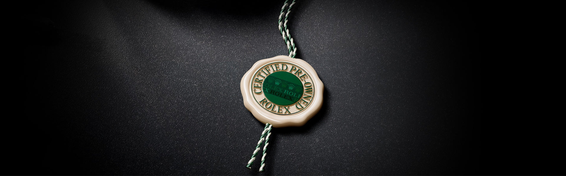Rolex Certified Pre-Owned Seal on Black Background