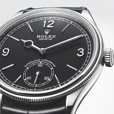 Rolex 1908 perpetual white gold case with black dial and white gold accents. 