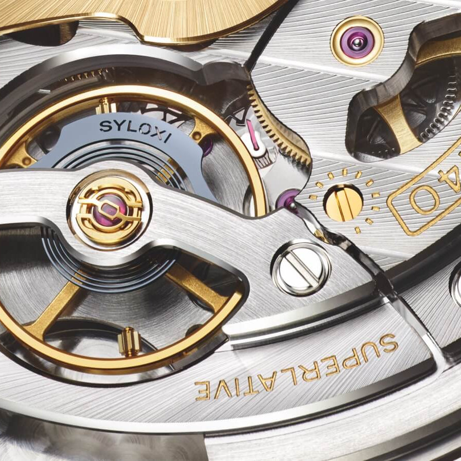 Close up of the movement of the Rolex 1908 watch. Showing the detail of the Syloxi hairspring silicon.