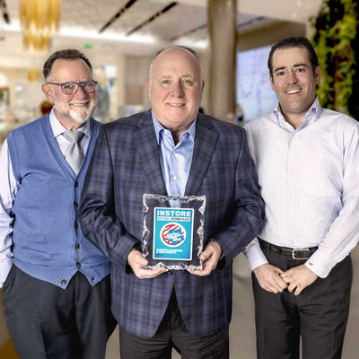 Steven, Howard and Mark Tapper at Tapper's Somerset Collection holding an award after winning 2nd place for Instore Magazines 17th Annual America's Coolest Stores contest.jpg