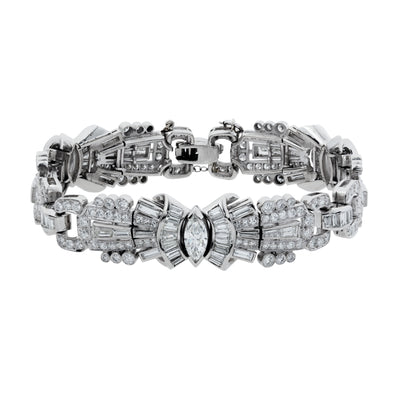 ESTATE PLATINUM VINTAGE MARQUISE DIAMOND BRACELET FEATURING 12.00 CARATS TOTAL OF MARQUISE, ROUNDS AND BAGUETTES, WITH DECO CHAIN SAFETY CHAIN CLSAP