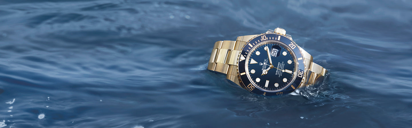 Rolex 18K Gold Submariner with Blue Dial