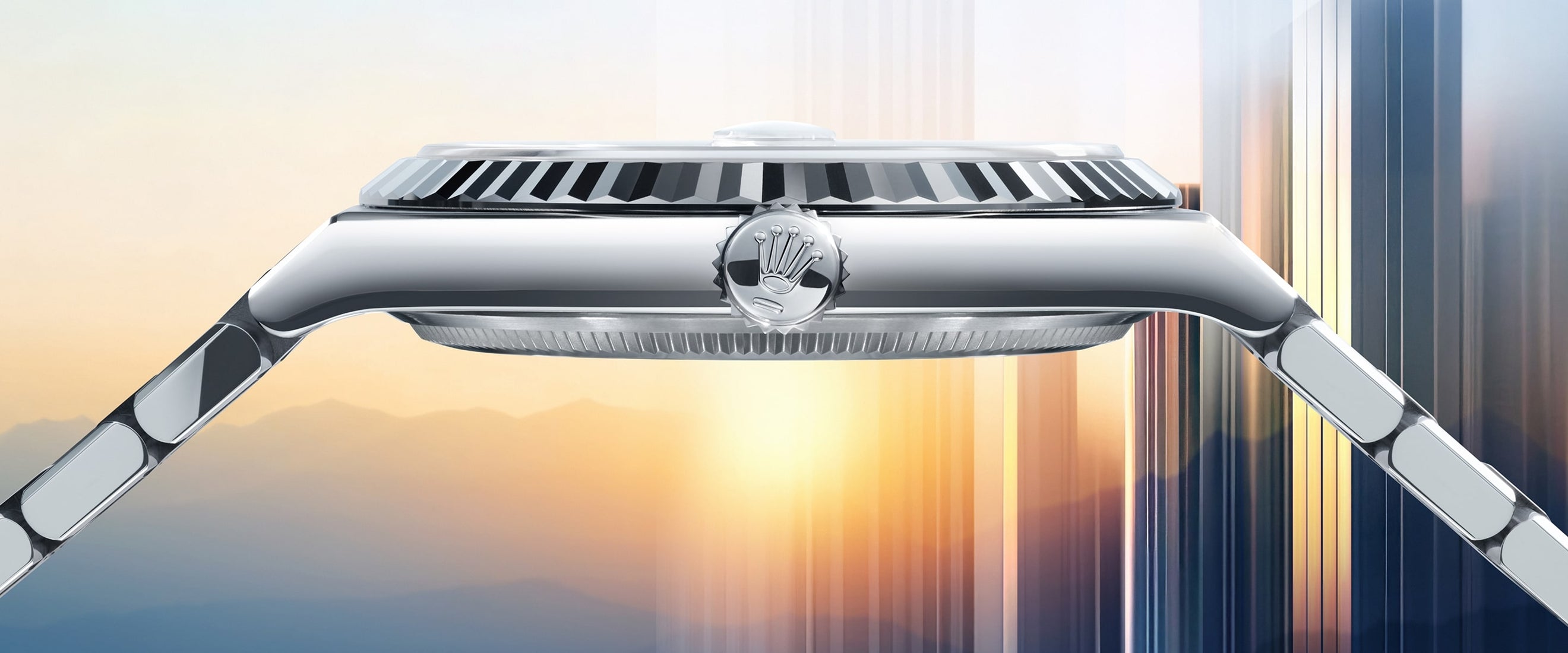 Close-up of a silver watch with a blurred background