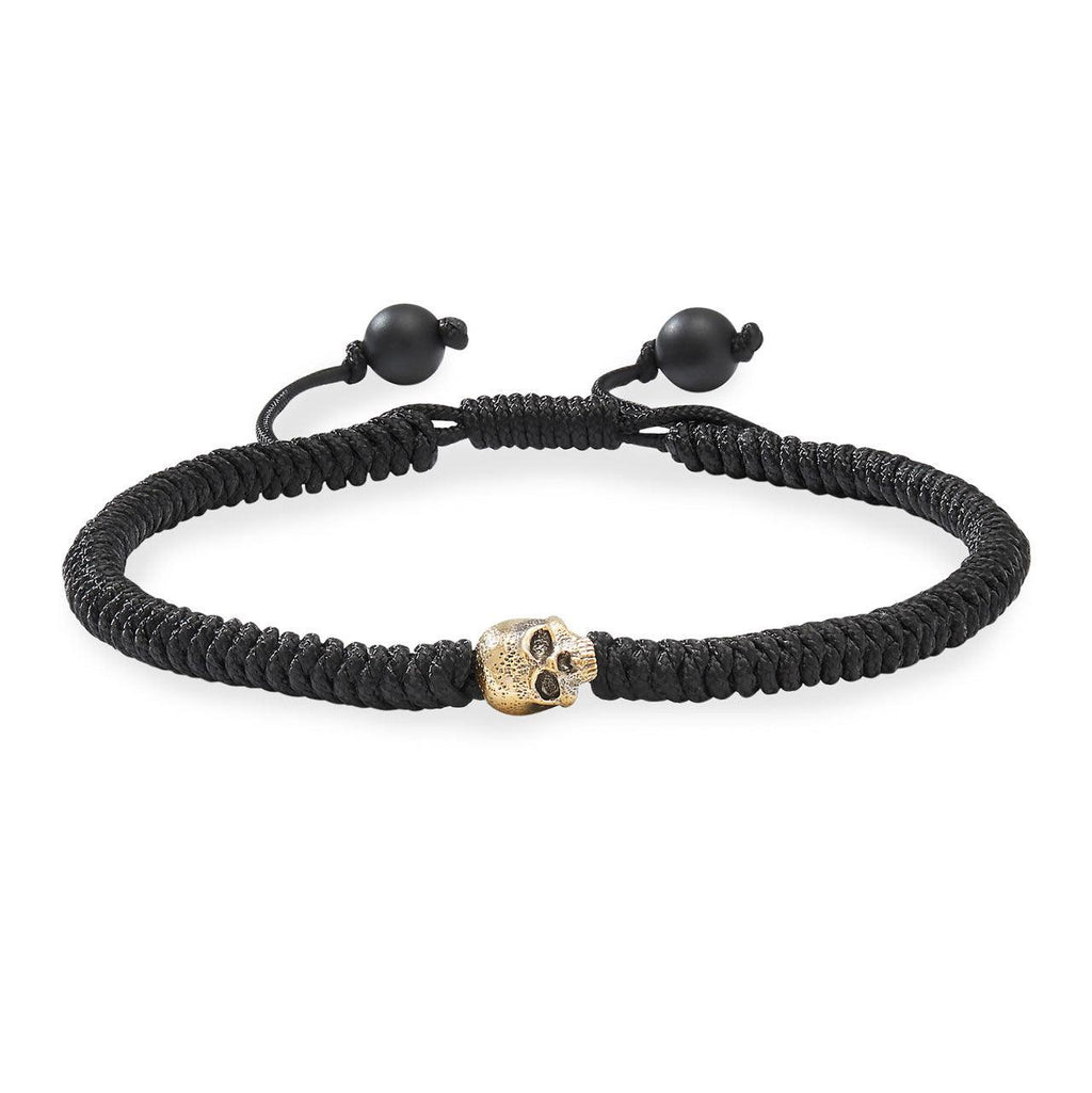 WOVEN SKULL BEAD BRACELET WITH 18K YELLOW GOLD IN BLACK NYLON